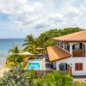 https://atlantis-beach-house.comcaribbean.com